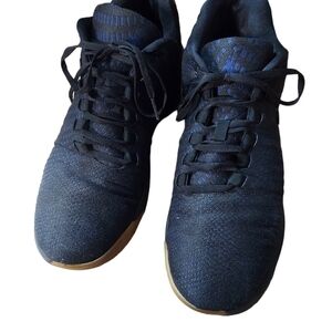 11 Jordan navy and black sneaker